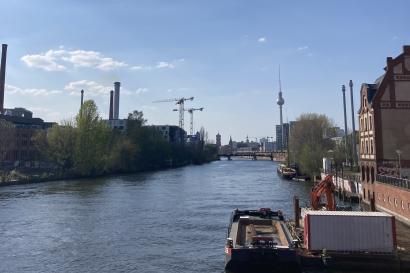 The river Spree and blue skies with Berlin's TV Tower in the distance