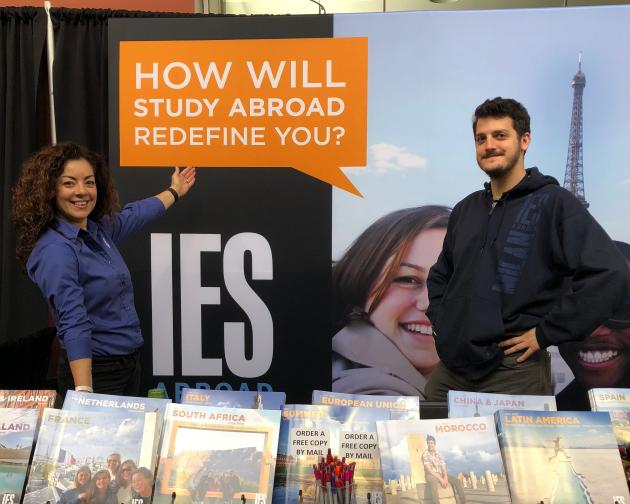 two College Relations Managers at a study abroad fair