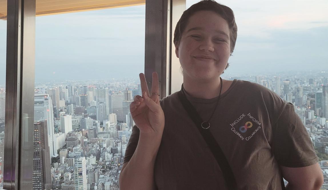Author, Macks, standing in front of the view from the top of Tokyo Tower.