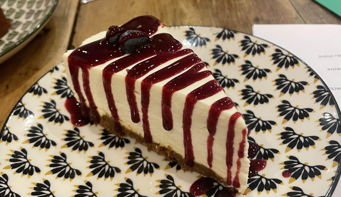 Cheesecake with raspberry sauce.