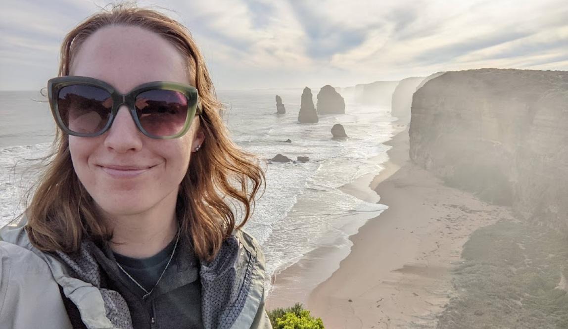 A selfie of me smiling in front of the twelve apostles rock formations off the south coast of Australia 