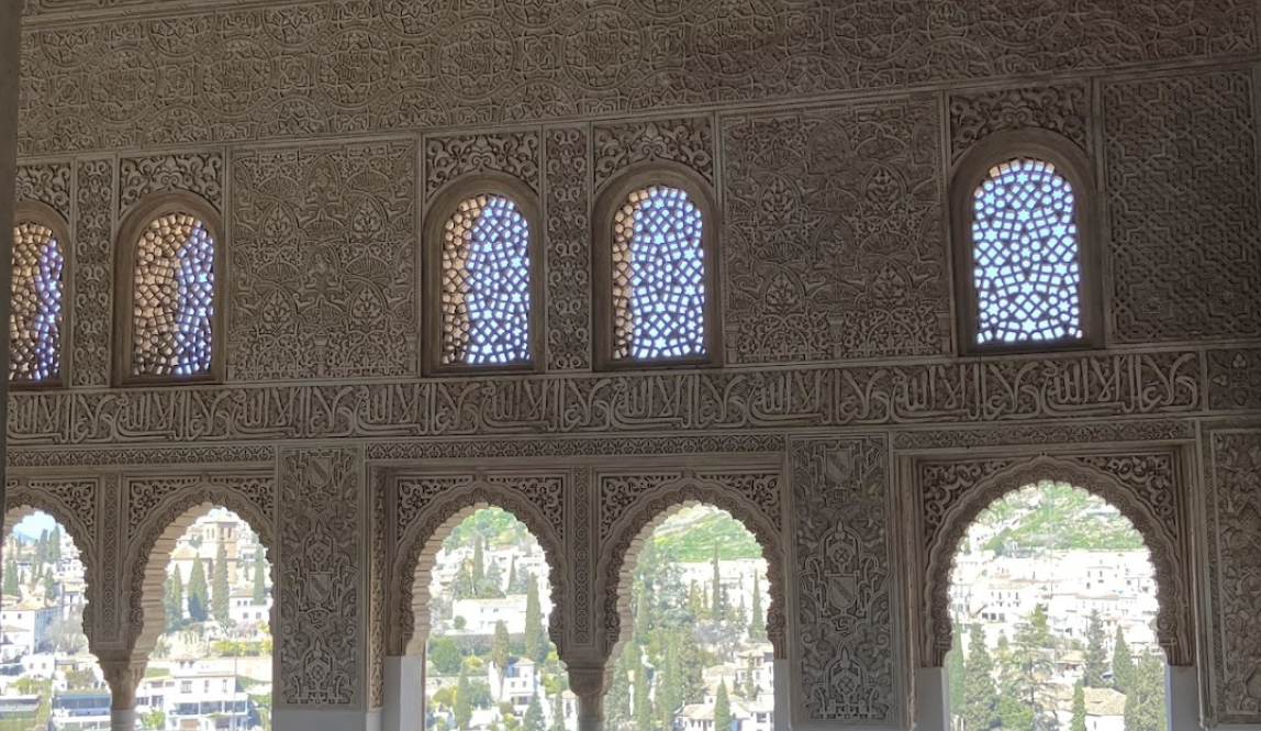 Window arches with Granada visible beyond