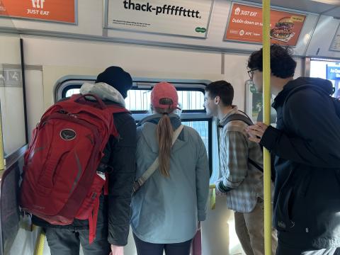 Four of my roommates on the dart to greystones for our hike