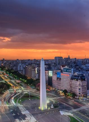 an aerial view of Buenos Aires and Obelisco at sunset