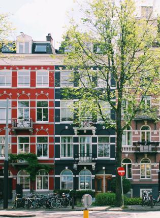 Classic Amsterdam buildings lining a street