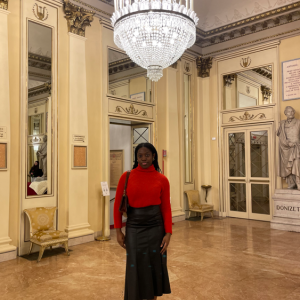 Dara in under a chandelier in Milan