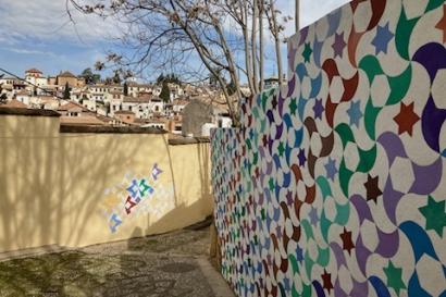A wall showing a multicolored mosaic tile pattern typical of Islamic architecture 