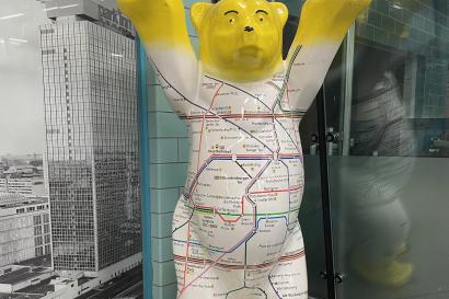 A bear statue with the BVG transit map on it