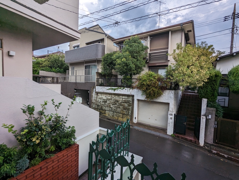 The view outside the front door of the apartment after the rain stopped