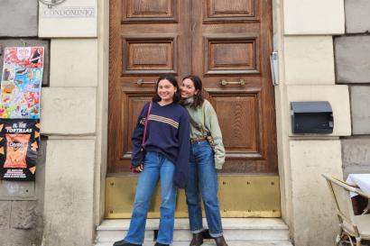 My sister and I in front of our apartment building — we  lived in the same building, but were in different apartments.