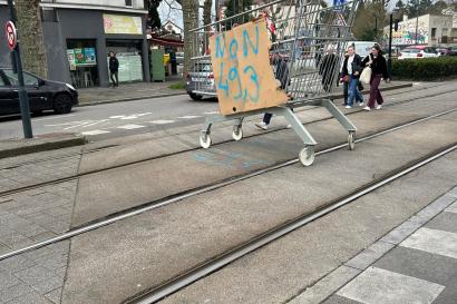 Cart Blocking the Tram in Protest of Article 49.3