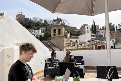 Students studying on the IES Granada rooftop terrace.  