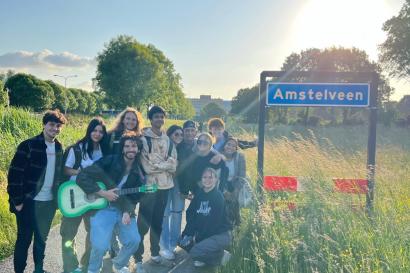 A photo of a group of my friends and I by the Amstelveen sign during our walk home one day