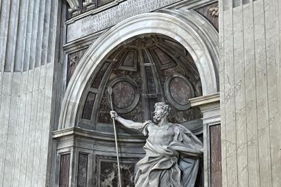 Statue holding a staff in St peter's basilica in Rome