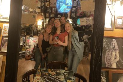 mirror photo of some friends in a jazzy vintage cafe