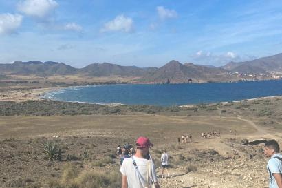 IES students walking down the volcanic rocks after their 3 mile hike to another beach in the Cabo de Gata National Park.