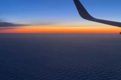 A view of the sunset from a plane.