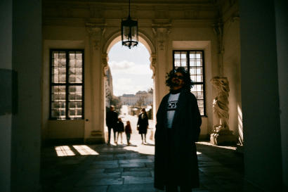 A photo of me in front of the Belvedere Schlossgarten!