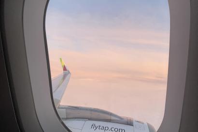 View of a sunset out of a plane window seat