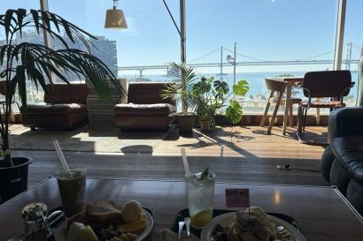 This is a photo of the Gwangalli beach seen from inside of a restaurant.