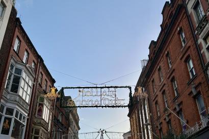 Holiday lights over a street