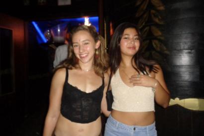 Me and my friend Keala smiling at the entrance to Mae West, the biggest club in Granada. 