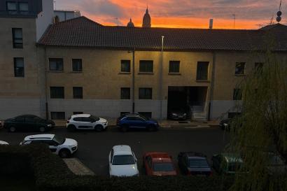 A sunset from the view of a dorm room in Salamanca