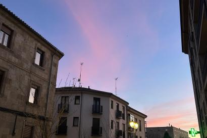 A beautiful sunset with hues purple, pink, blue, and yellow. 