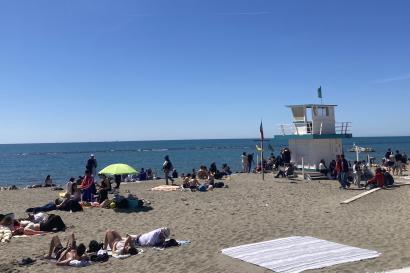a beach with a lifeguard tower