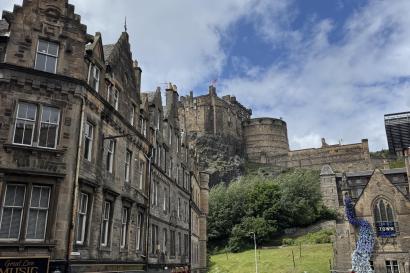 The view of Edinburgh Castle from a street below