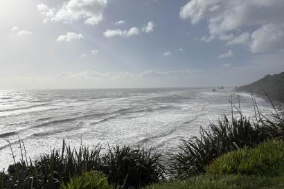 A landscape view of the crashing waves of the West Coast.