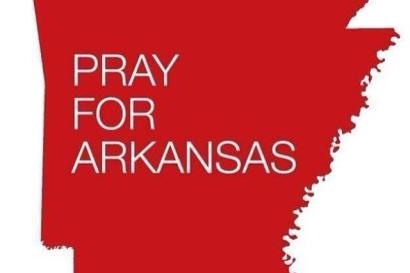 Red silhouette of Arkansas with "Pray for Arkansas" text in white. This alt text was added with Al; accuracy may vary.