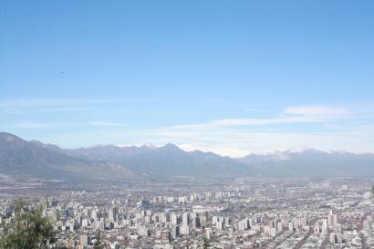View of Valparaíso harbor with ships and city skyline under a blue sky. This alt text was added with Al; accuracy may vary.