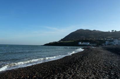 A gray, overcast Paris skyline featuring the Eiffel Tower in the distance. This alt text was added with Al; accuracy may vary.