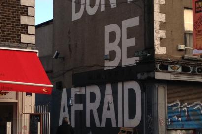 An image of graffiti on the side of a building on Camden Street in Dublin, which reads, "DON'T BE AFRAID."