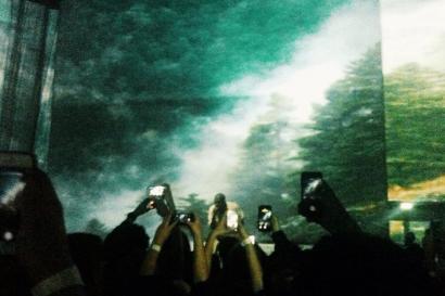 Crowded subway platform with passengers waiting for a train. This alt text was added with Al; accuracy may vary.