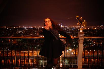 Suitcase with red hiking boots in front. This alt text was added with Al; accuracy may vary.