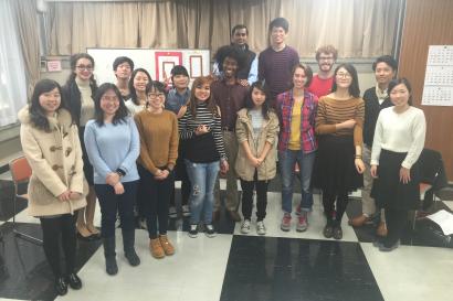 Elegant chandelier on wooden beam ceiling. This alt text was added with Al; accuracy may vary.