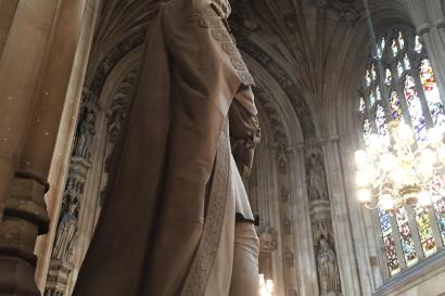 A statue inside the Houses of Parliament
