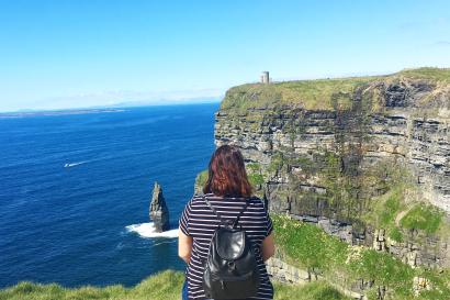 Staring dramatically out at the Cliffs of Moher.