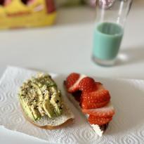 bread with avocado and Nutella with strawberries