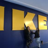 A picture of my friends in front of the Nantes Ikea sign