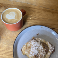 Cappuccino and almond croissant at Bread 41