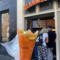 Vlamese frittes in front of the store front!