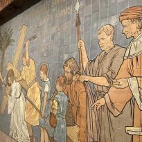 Hand painted tiles of men in Delft