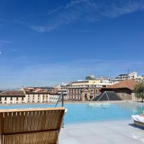 View from rooftop pool overlooking city of Madrid 