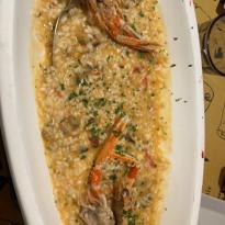 Plate of seafood risotto in Venice 