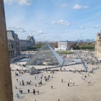 The view from the third floor of the museum looking out at the Louvre pyramid. 