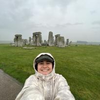 Paulina is seen with the Stonehenge stones. 