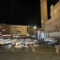 photo of the siena christmas market at night 
